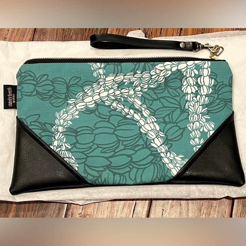 Brand New! Large clutch with leather strap in Peacock (color)